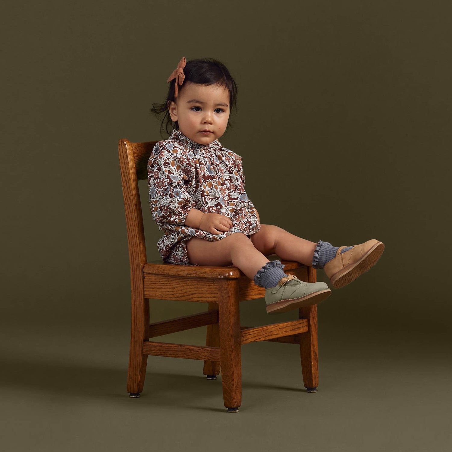 Little girl sitting in chair wearing Rylee and Cru Quincy Blouse Set - Autumn Bloom