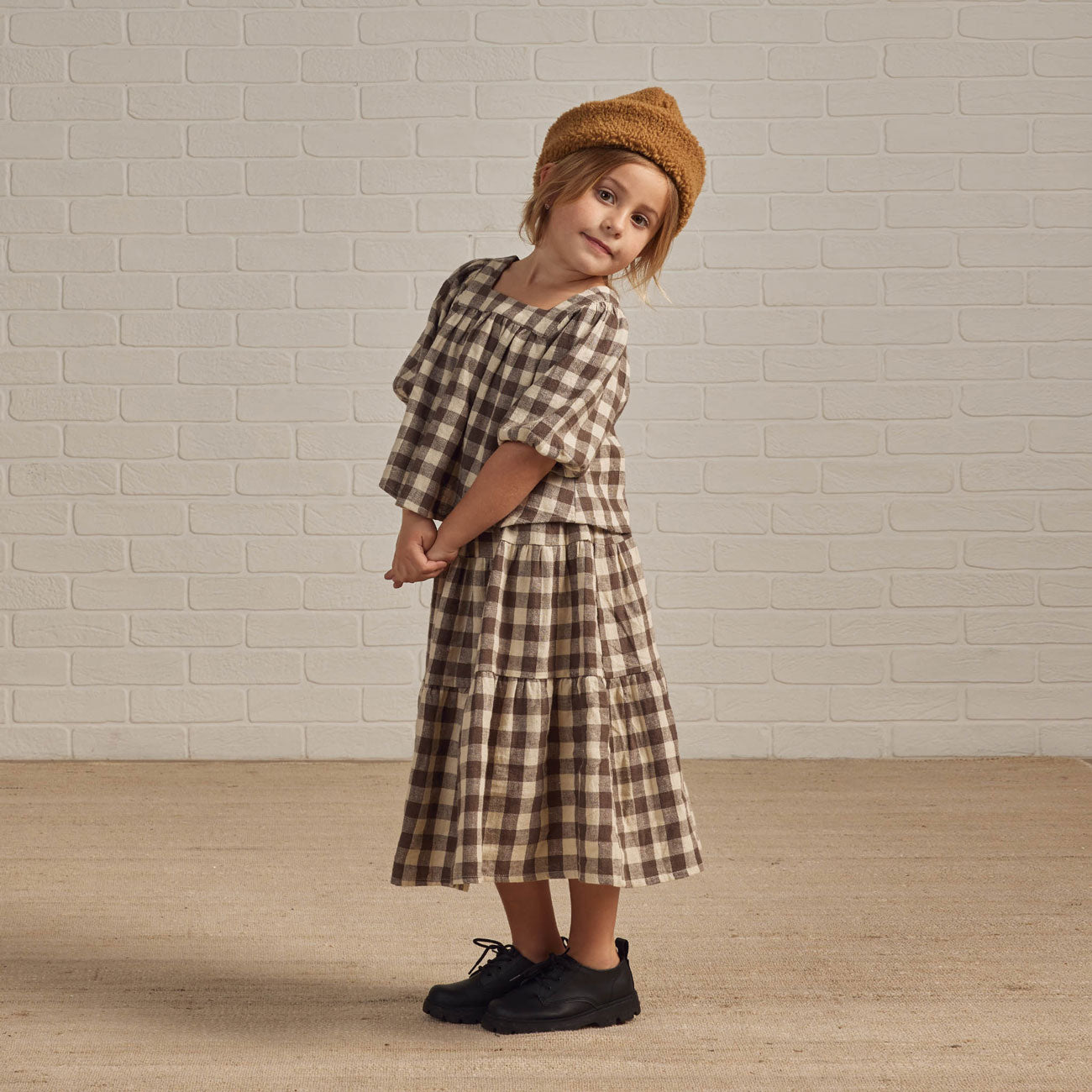 Little girl wearing Rylee and Cru Tiered Midi Skirt - Charcoal Check - Natural / Charcoal