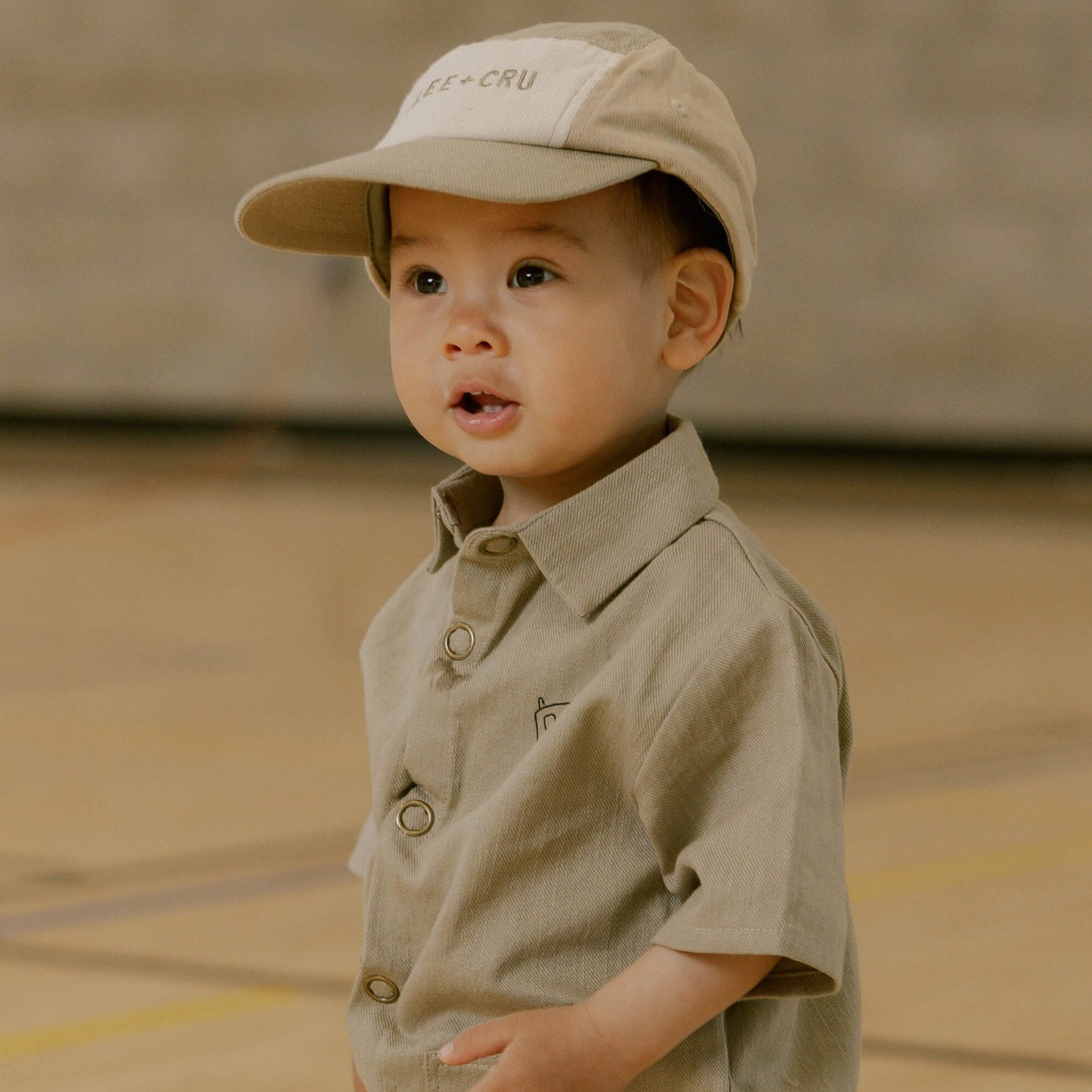 Little boy wearing Rylee and Cru Rhett Jumpsuit - Fern