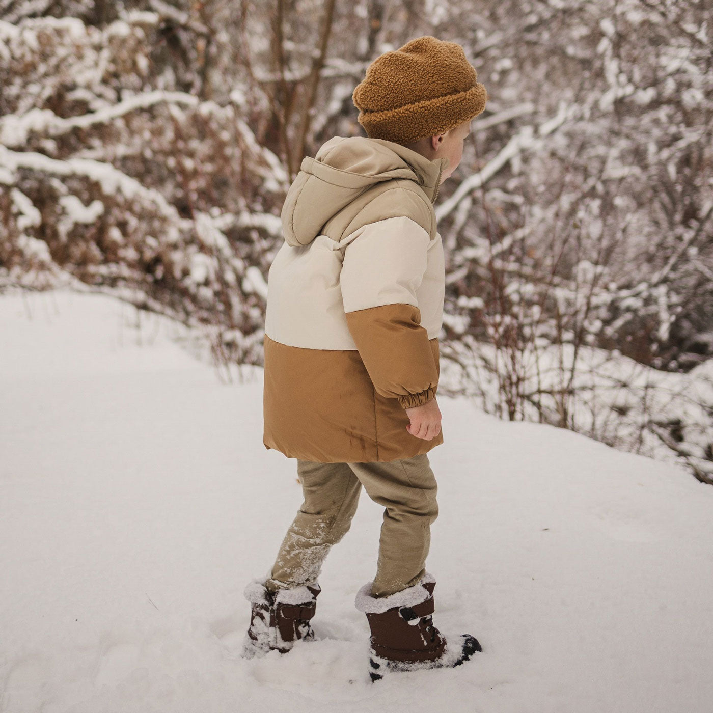Boy wearing Rylee and Cru Puffer Jacket - Color Block - Sand / Natural / Brass