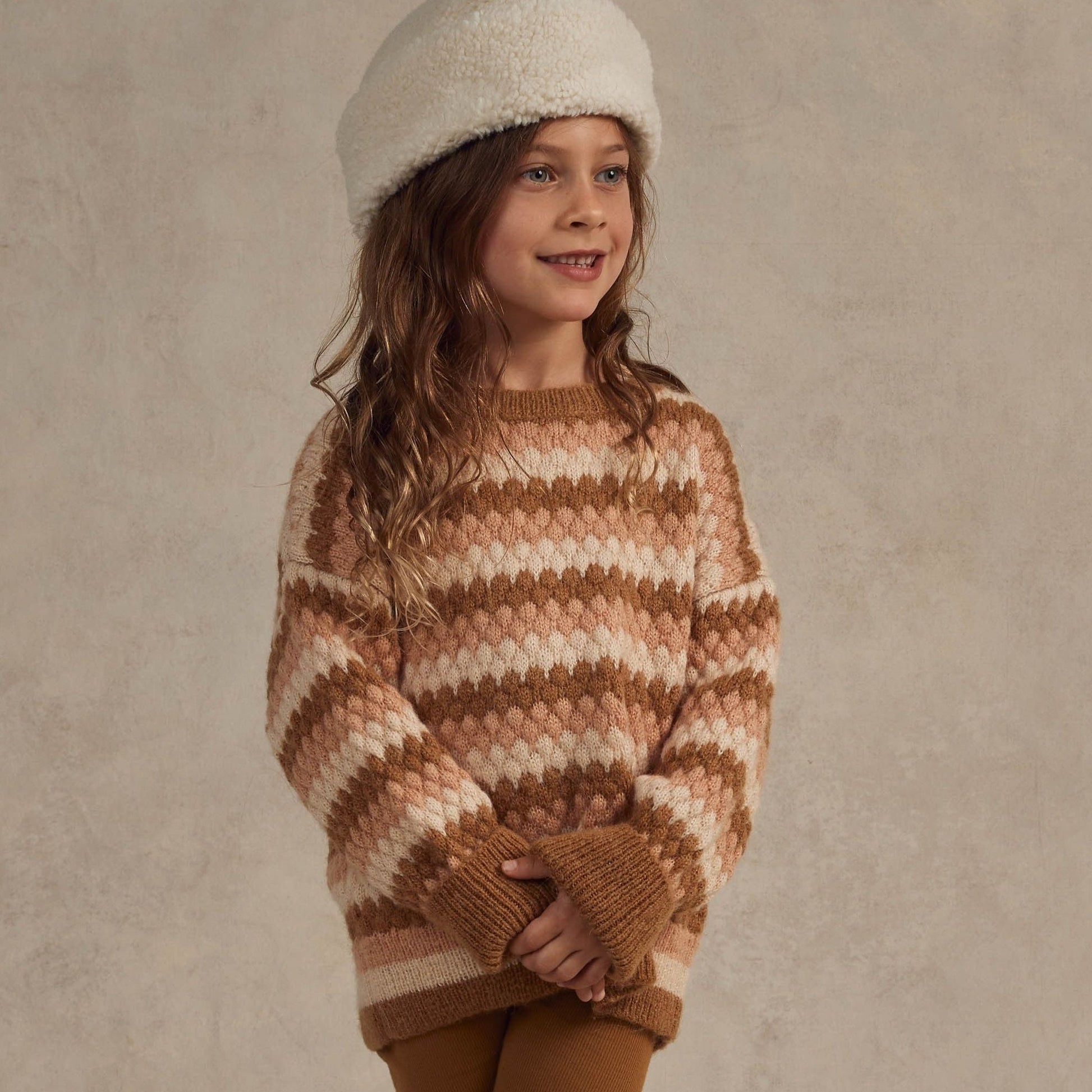 Girl wearing Rylee and Cru Aspen Sweater - Multi-Stripe - Brass / Sand / Natural
