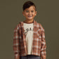 Boy wearing Rylee and Cru Hooded Overshirt - Brown Plaid