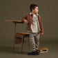 Boy wearing Rylee and Cru Kalen Pant - Charcoal Check - Natural / Charcoal