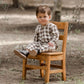 Toddler wearing Rylee and Cru Long Sleeve Woven Jumpsuit - Charcoal Check - Natural / Charcoal
