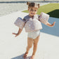 Little girl wearing Current Tyed Clothing Swim Floaties - Gold Suns