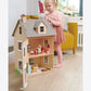 Little girl playing with Tender Leaf Toys Foxtail Villa Doll House