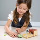 Girl plays with Tender Leaf Toys Tortoise Pet Set