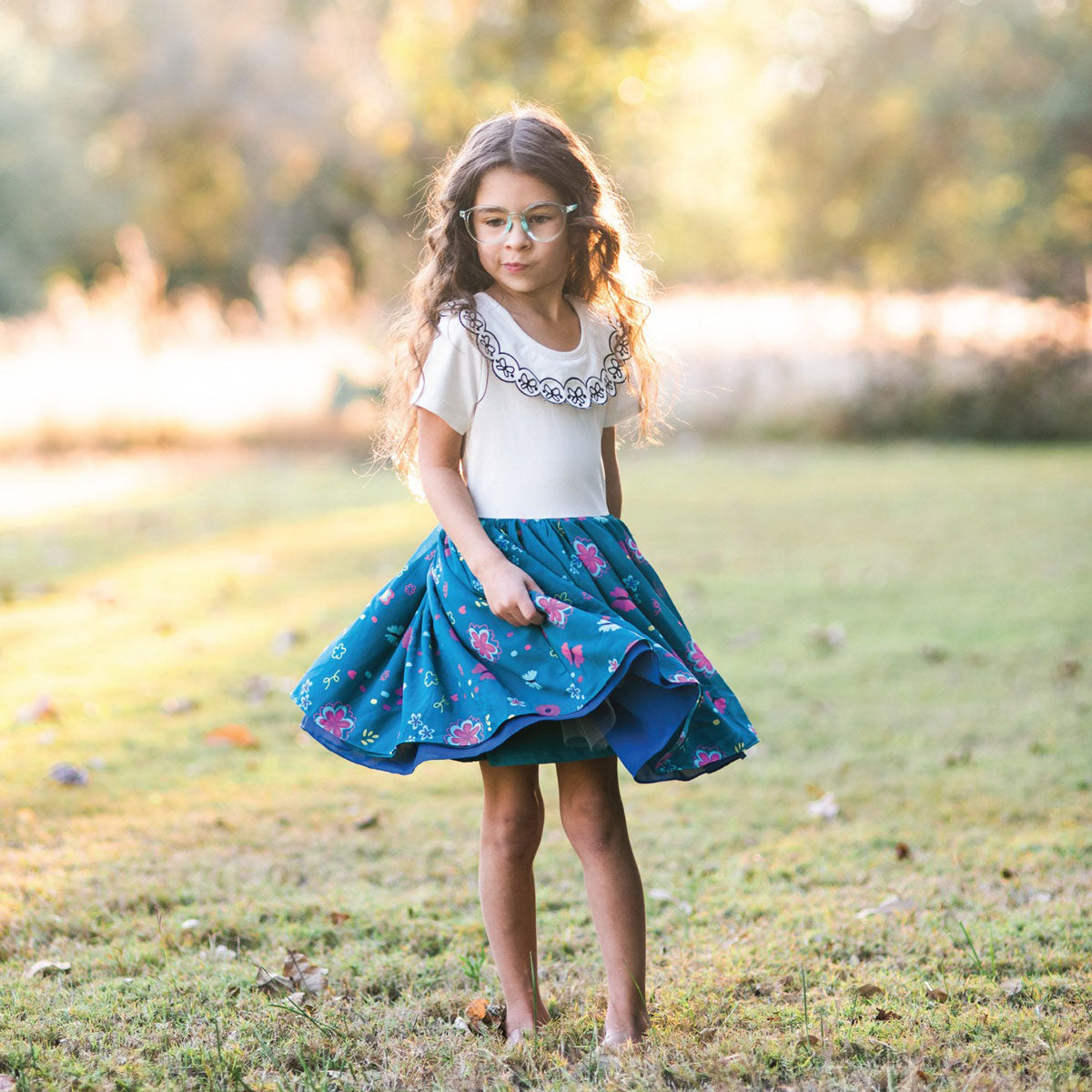 Little girl wearing Taylor Joelle Ordinary Butterfly Dress