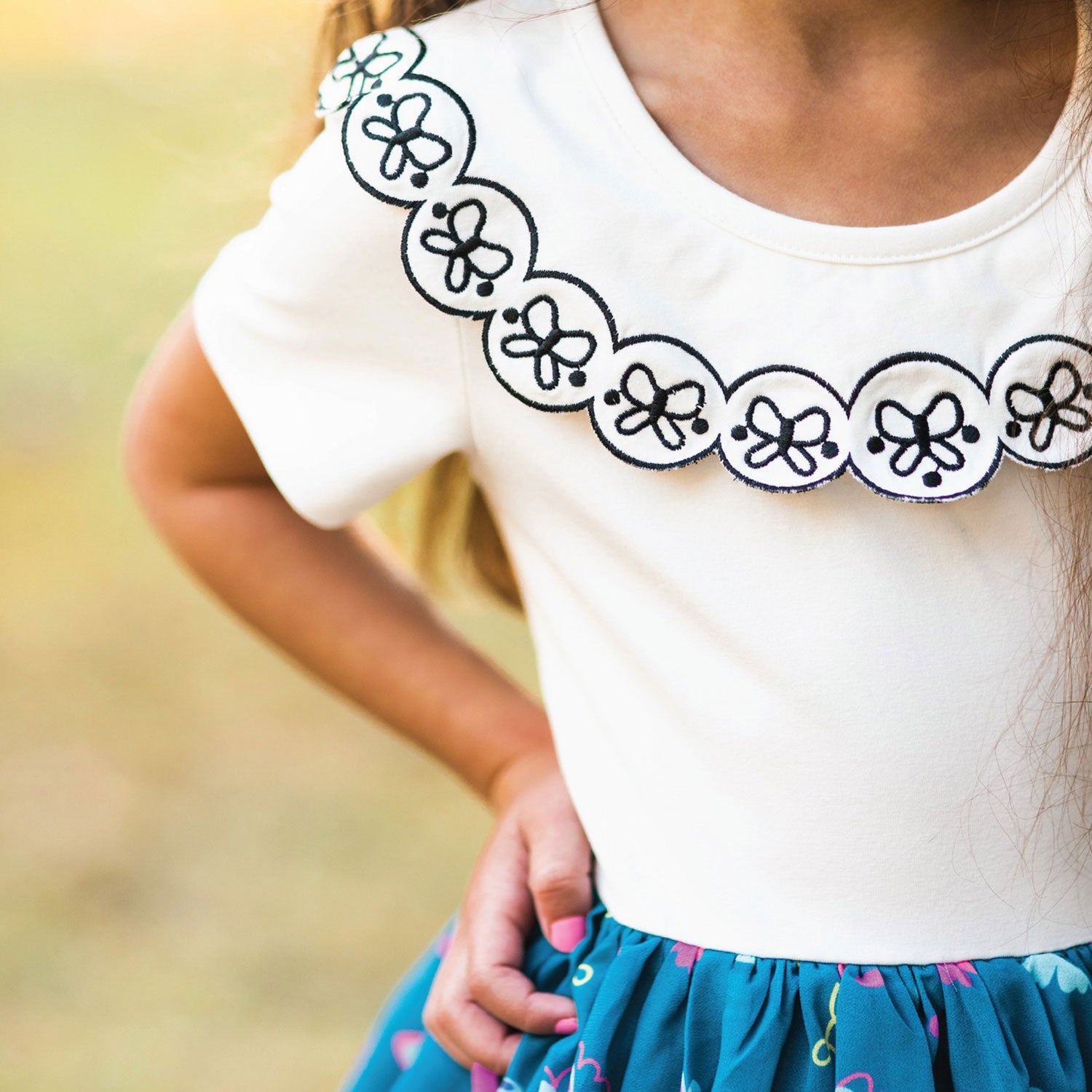 Little girl wearing Taylor Joelle Ordinary Butterfly Dress