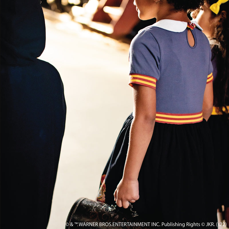 Girl wearing Taylor Joelle Gryffindor™ Dress Set