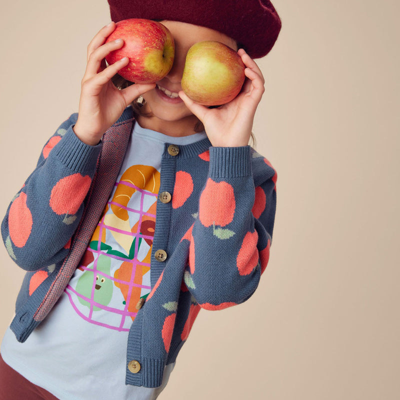 Girl wearing Tea Collection Iconic Cardigan - Normandy Apples