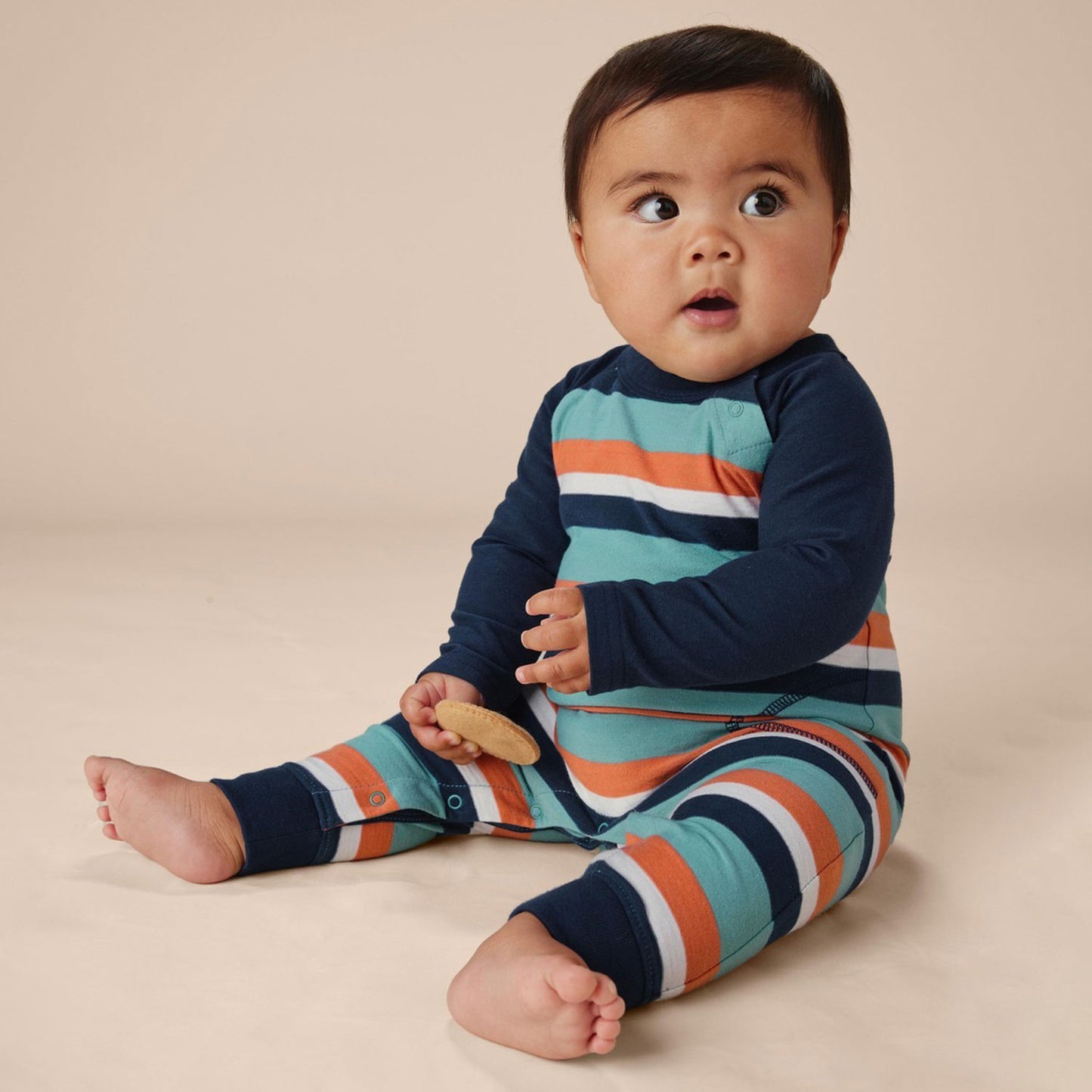 Baby wearing Tea Collection Striped Raglan Romper - Seaspray