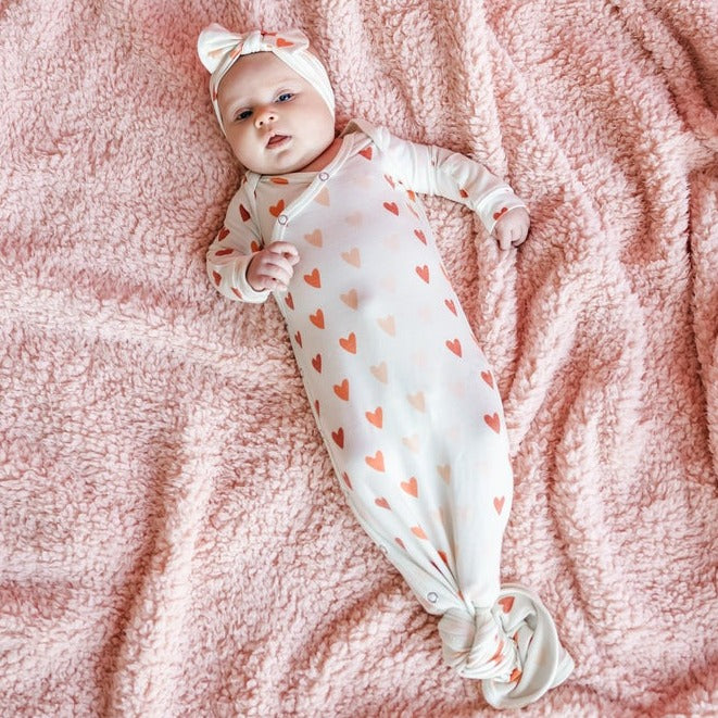 Baby wearing Copper Pearl Seasonal Newborn Knotted Gown - Cupid