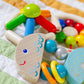 HABA USA Rattlefish Wooden Baby Rattle