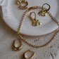Katie Waltman Jewelry Gold Starburst Heart Huggies