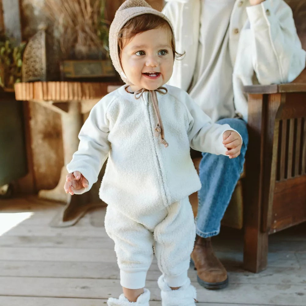Baby wearing goumikids Sherpa One-Piece - Alabaster