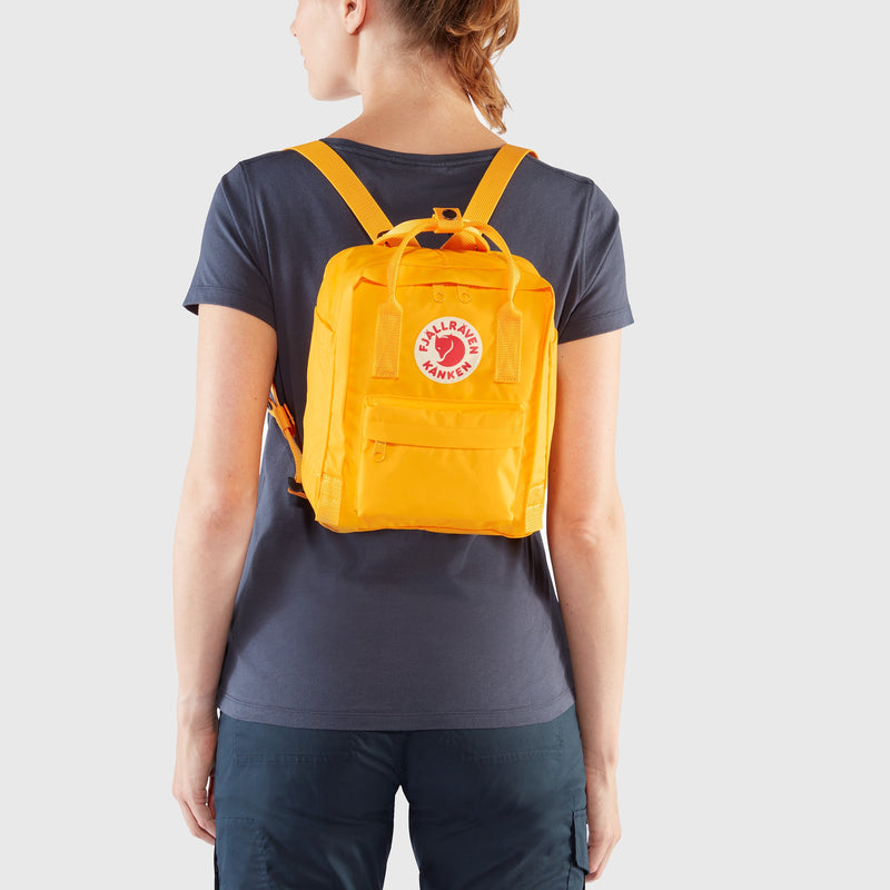 Woman wearing Fjallraven Kanken Mini Backpack