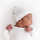 Baby wearing Kyte BABY Knotted Cap - Cloud