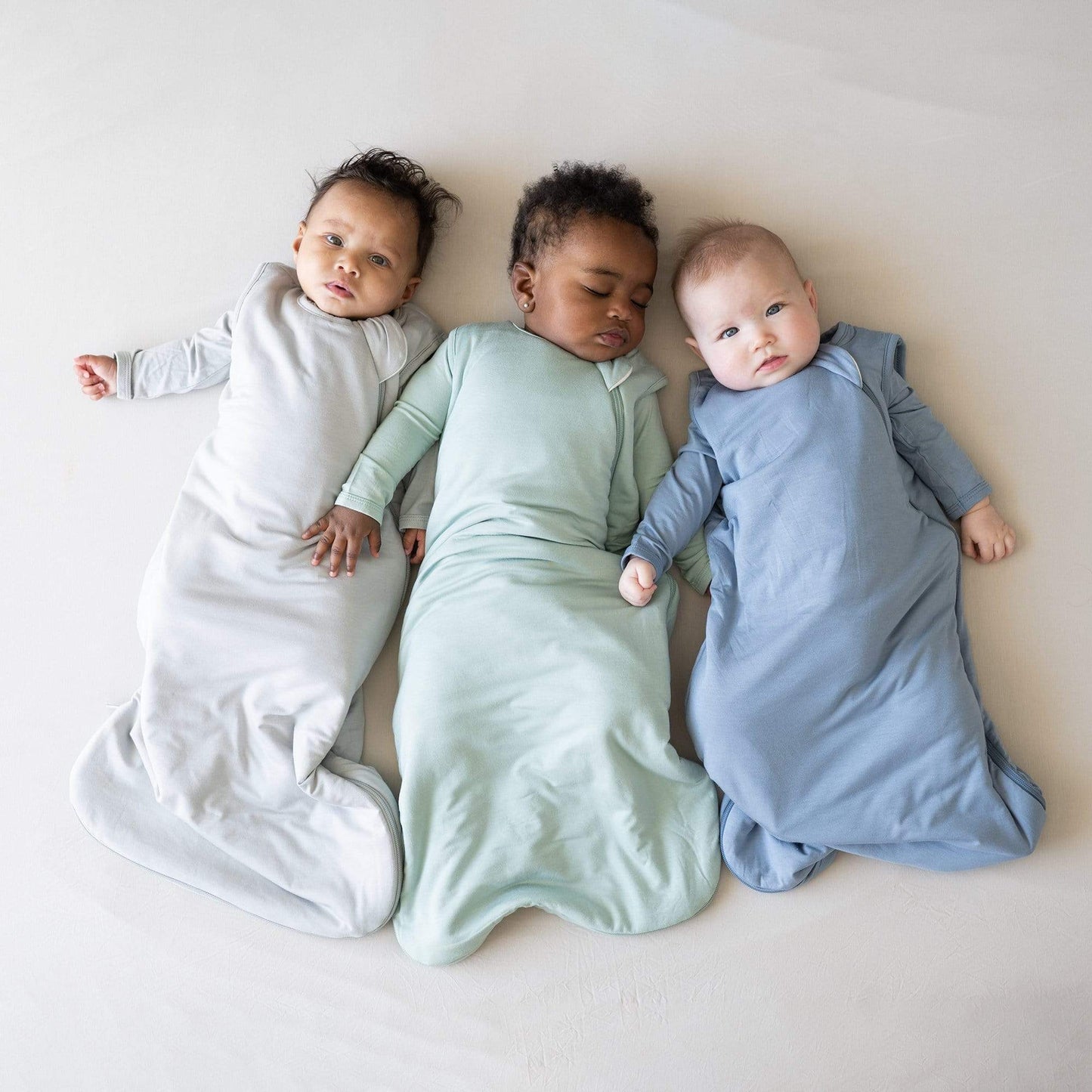 Babies wearing Kyte Baby Sleep Bags