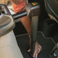 Woman installs Tavo Maeve + Roscoe 3-in-1 Pet Protection System - Medium Flex - Brindle car seat base