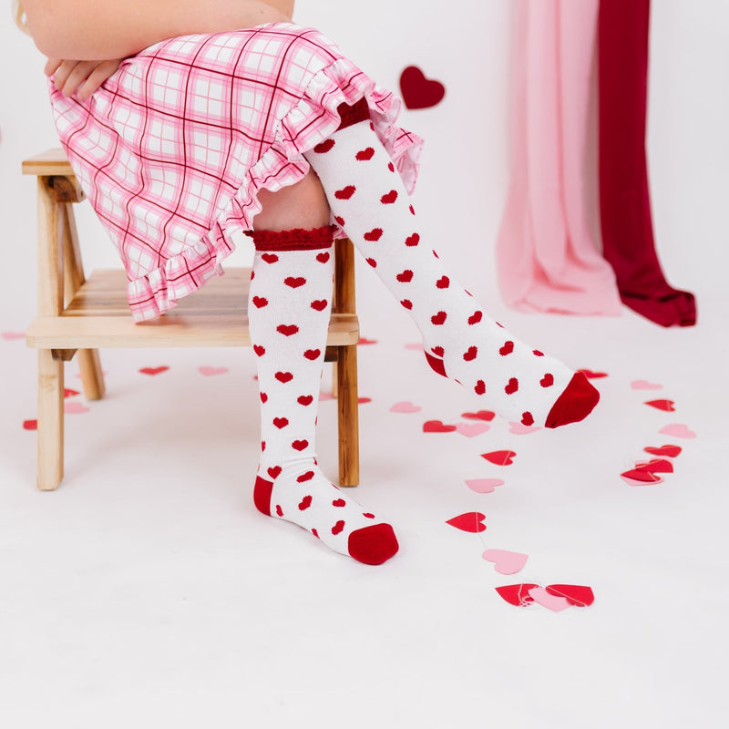 Little girl wearing Little Stocking Co Knee High Socks - True Love Lace Top