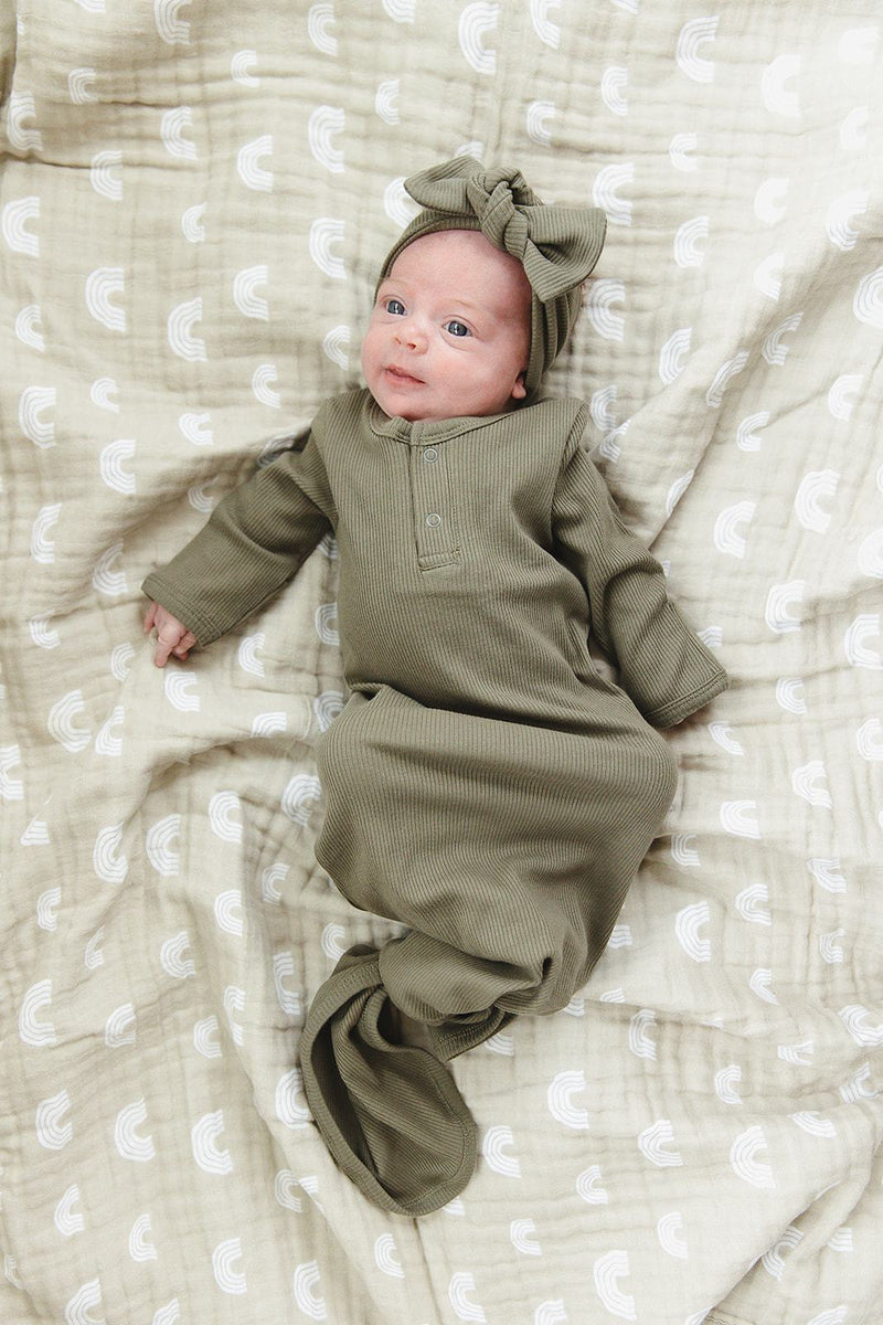 Baby wearing Mebie Baby Ribbed Knot Gown - Winter Green