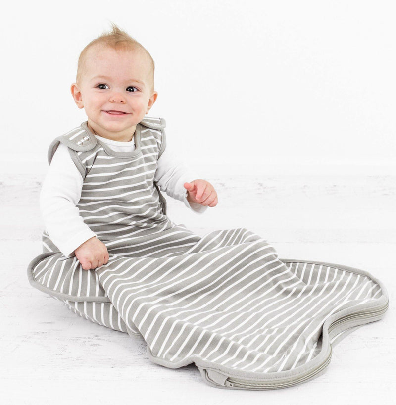 Toddler sitting up wearing Woolino 4 Season Ultimate Baby Sleep Bag - Merino Wool / Organic Cotton - Earth