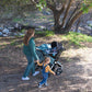 Mother Pushing Baby in Bumbleride 2022 Indie Twin Stroller - Sea Glass