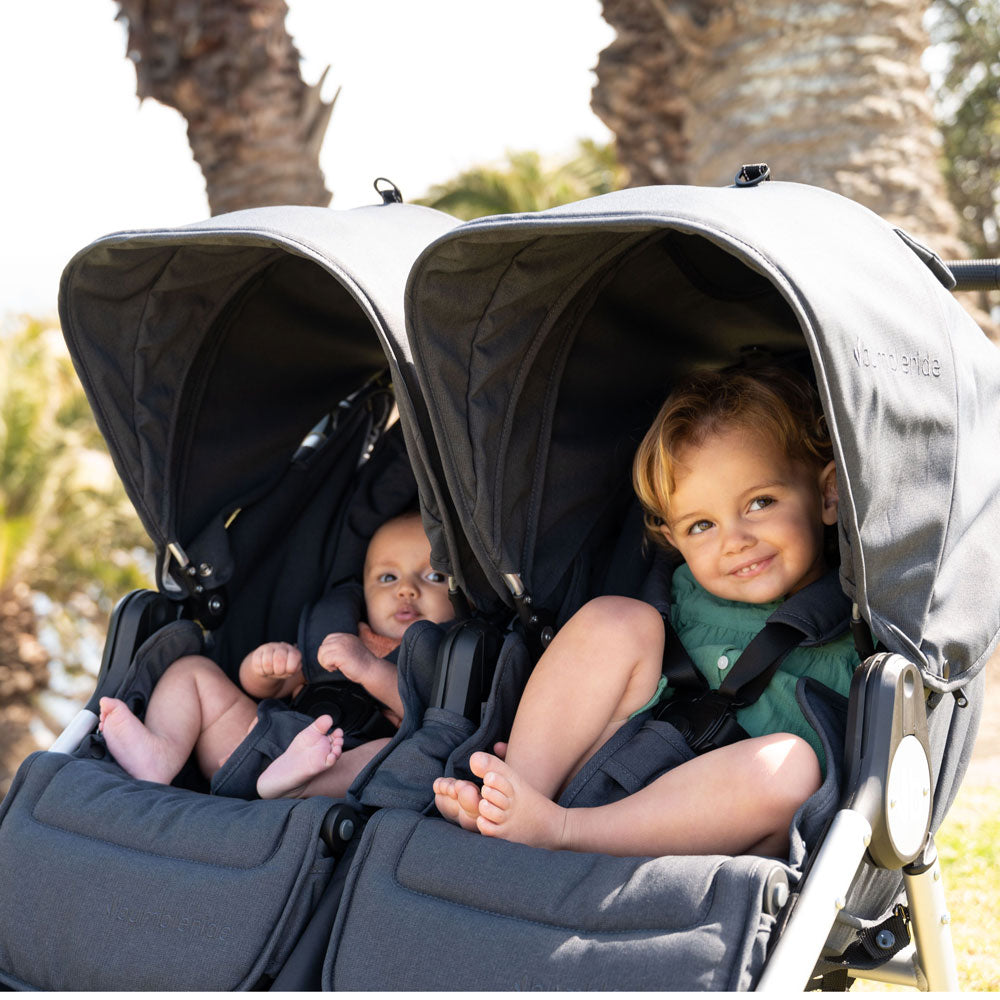 Baby and Child sitting in Bumbleride 2022 Indie Twin Stroller - Dusk