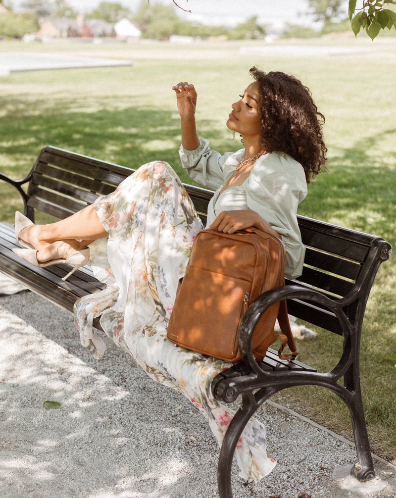 Azaria La Jolie on a park bench