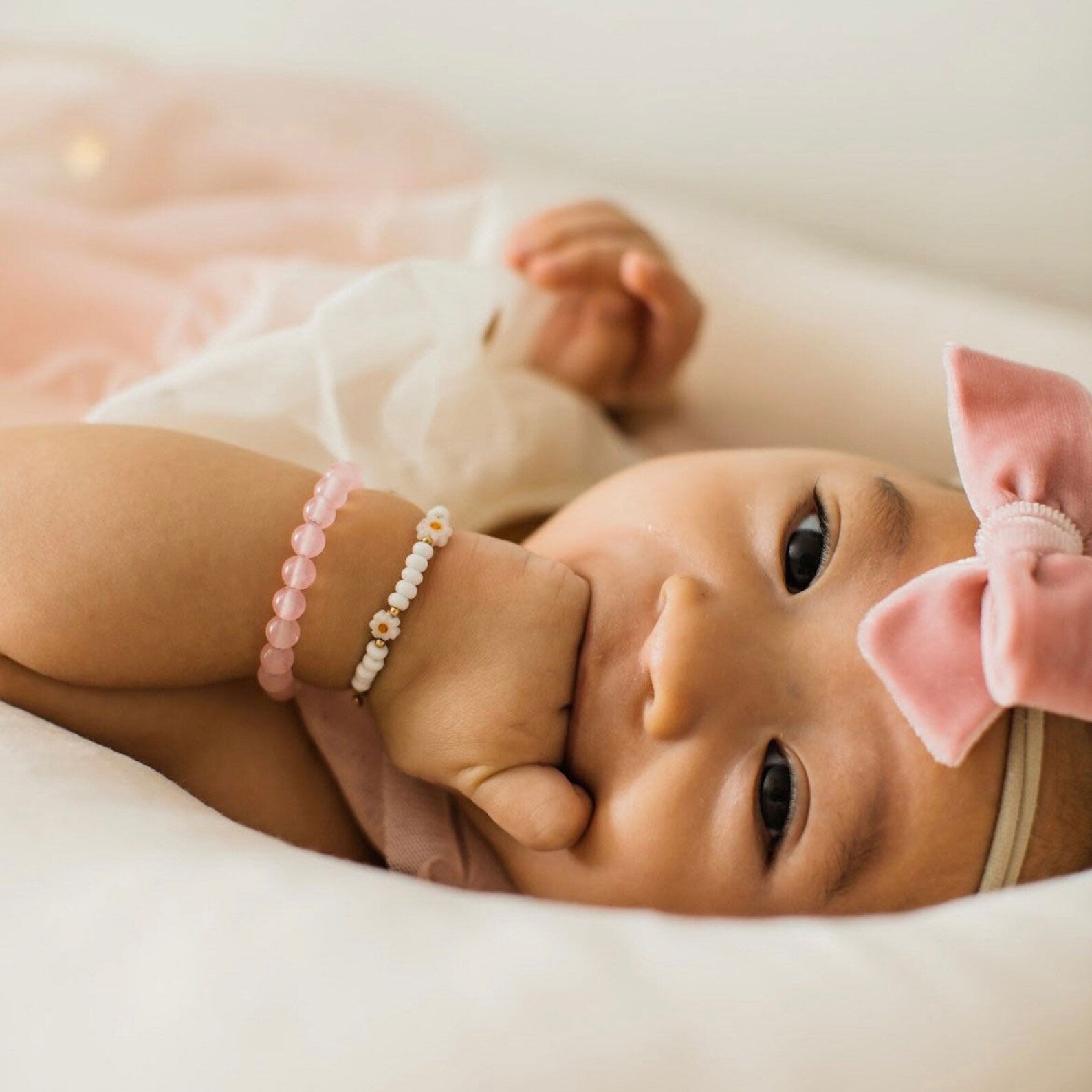 Baby wearing LittleLundsCo Bracelet - White Daisy 