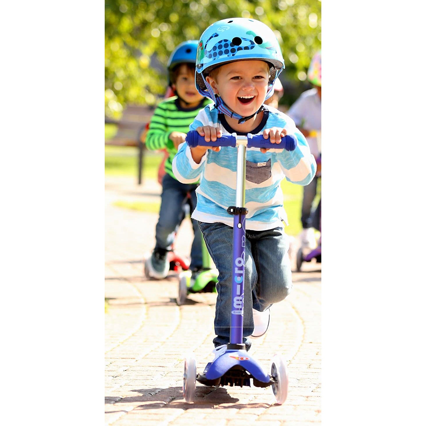 Little boy riding Micro Kickboard Mini - Blue