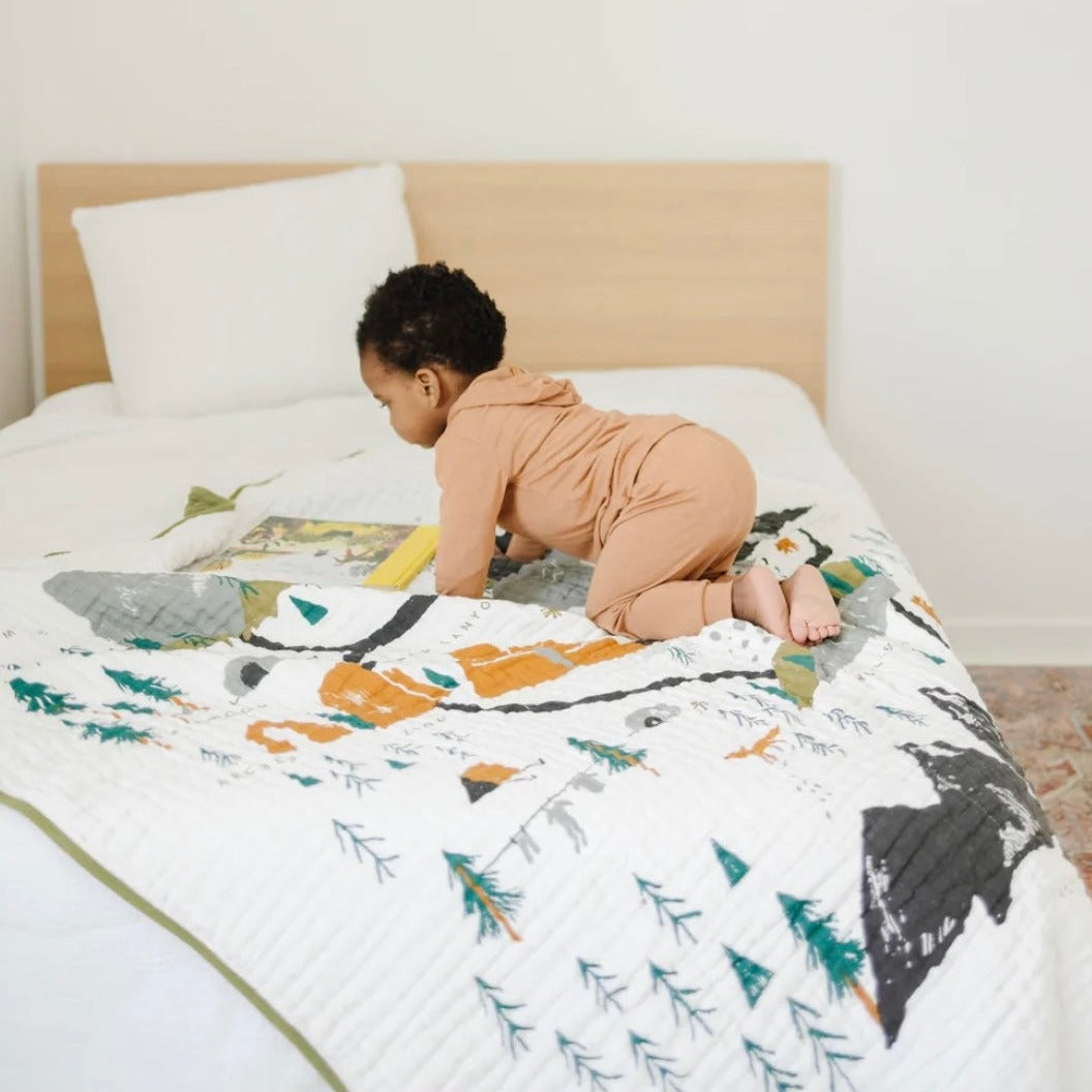 Child on Clementine Kids Cotton Muslin Reversible Throw Blanket - Large - National Parks