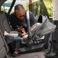 Man looks at baby in Nuna PIPA RX Infant Car Seat