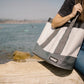 Woman holding Veer Tote Bag - White