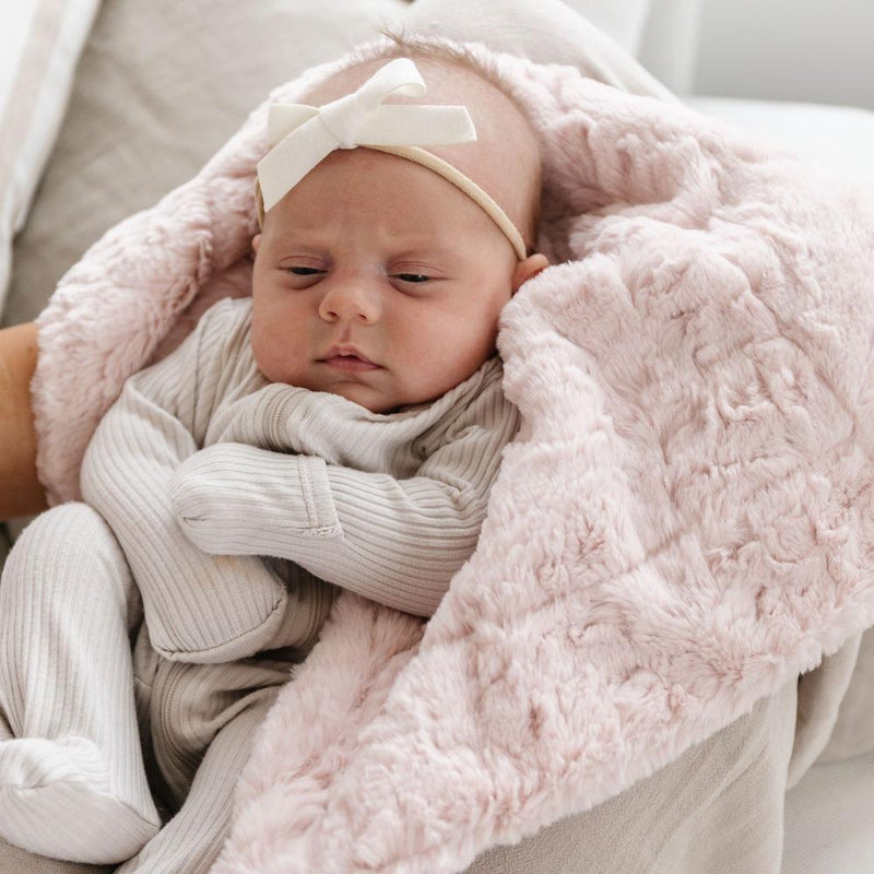 Baby wrapped in Saranoni Mini Dream Blanket - Blush
