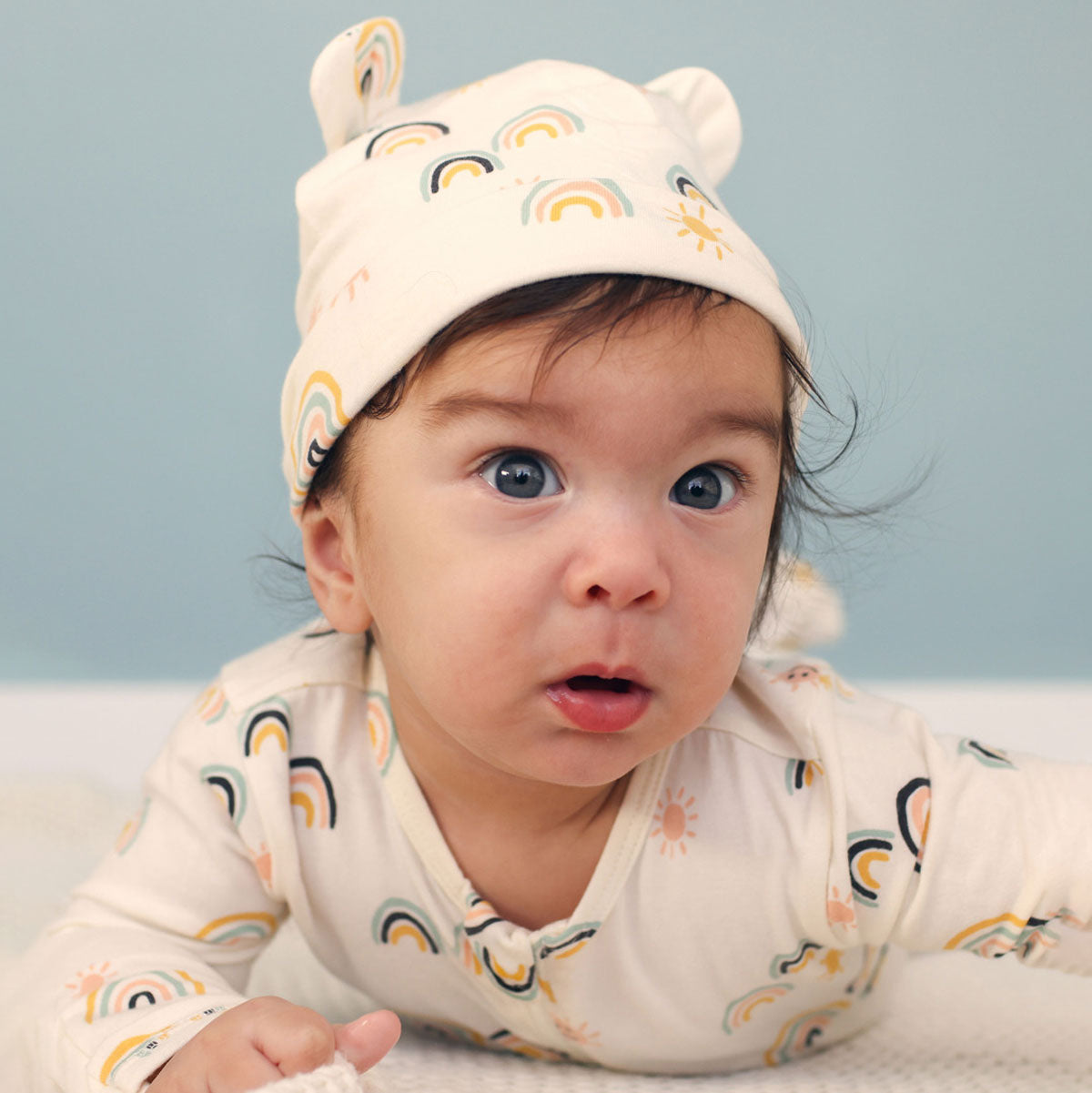 Baby wearing Tea Collection Baby Bear Hat - All Sunshine and Rainbows