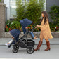 Woman pushes UPPAbaby VISTA V2 Stroller with RumbleSeat