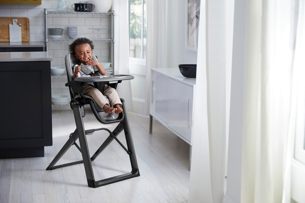 Toddler sitting in Baby Jogger City Bistro High Chair