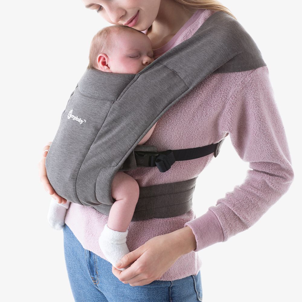 Mom wearing baby in Ergobaby Embrace Carrier - Heather Grey