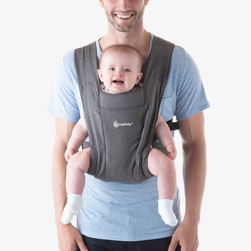 Dad wearing baby in Ergobaby Embrace Carrier - Heather Grey