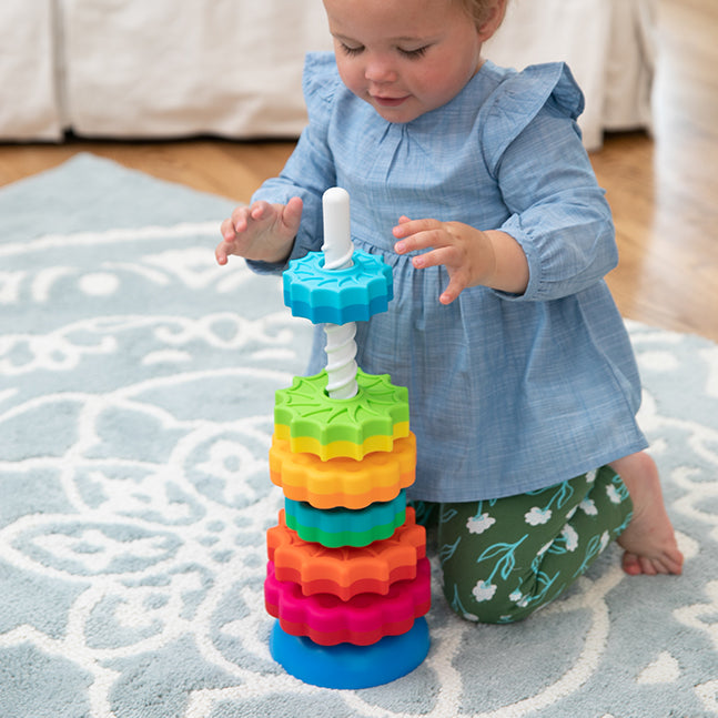 Child Playing with Fat Brain Toys SpinAgain Toy