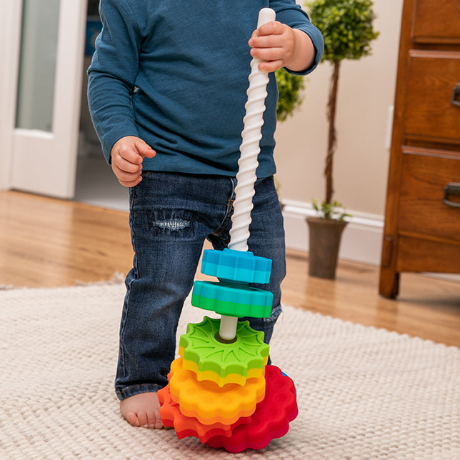 Child Playing with Fat Brain Toys SpinAgain Toy 