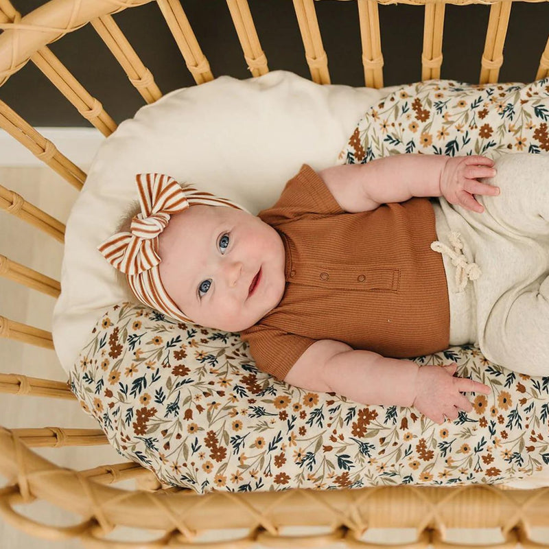 Baby wearing Mebie Baby Head Wrap - Rust Stripe