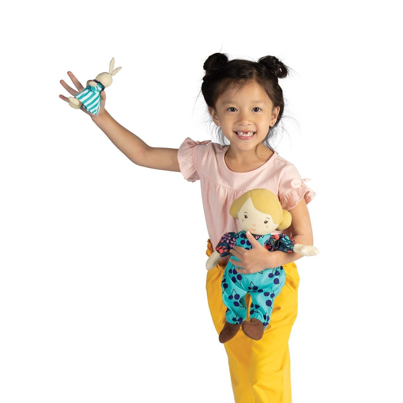 Girl holding Manhattan Toy Company Playdate Friends Doll - Ollie with Bunny