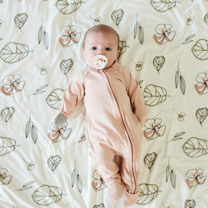 Baby wearing goumikids Footie - Rose