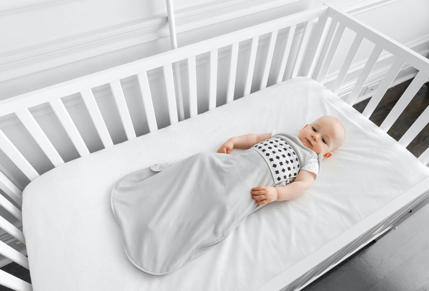 Baby in Crib in Nanit Sleeping Bag - Pebble Grey