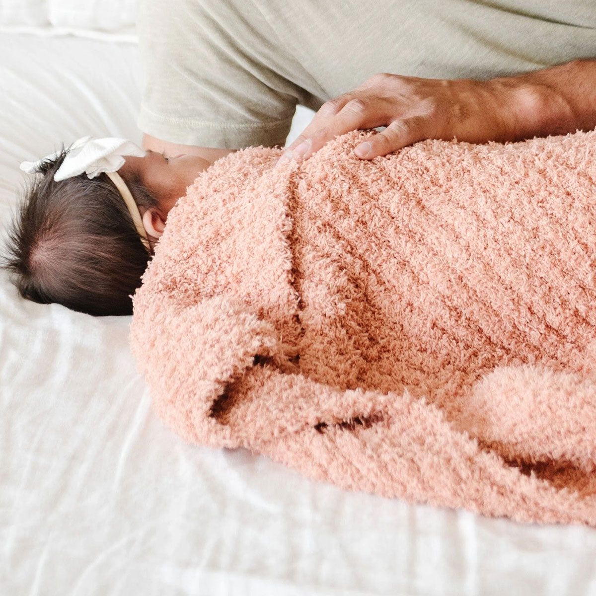 Baby wrapped in Saranoni Mini Ribbed Bamboni Blanket - Sun-kissed